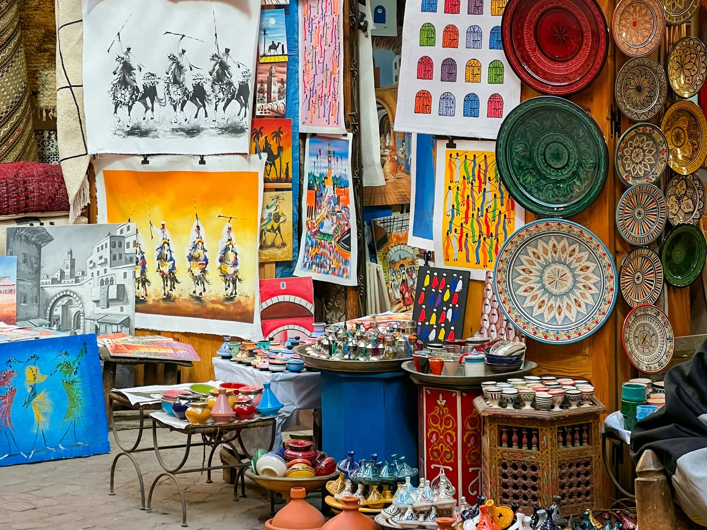An artisan's woven goods hanging on display